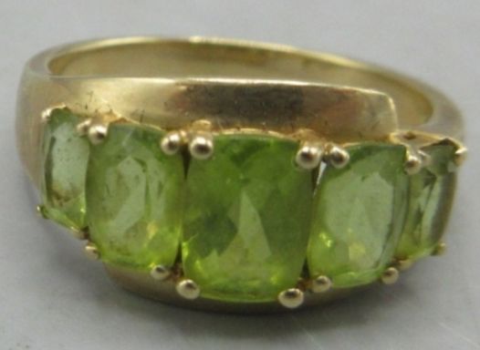 9 Ct Gold Graduated Peridot Five Stone Ring